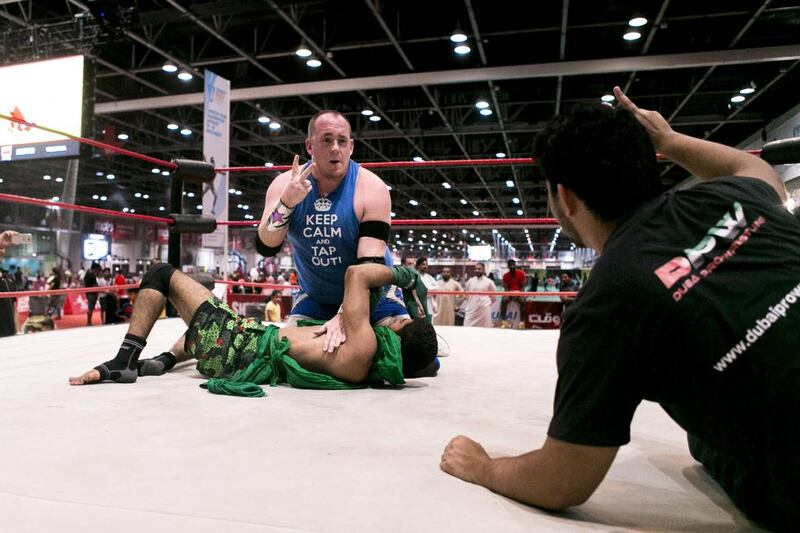 Rich 'N' Famous pins Cryptid during a Dubai Pro Wrestling match. Reem Mohammed / The National