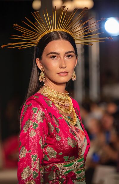 Each outfit is accessorised with jewellery, belts and eye-catching headpieces. Photo: Lara Dizeyee