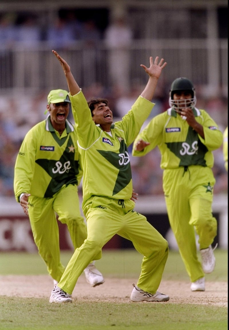 11 Jun 1999:  Saqlain Mushtaq of Pakistan takes only the 2nd hat-trick in World Cup history during the Super Six match against Zimbabwe at the Oval in London. Pakistan won by 148 runs.  \ Mandatory Credit: Ben Radford /Allsport/Getty Images