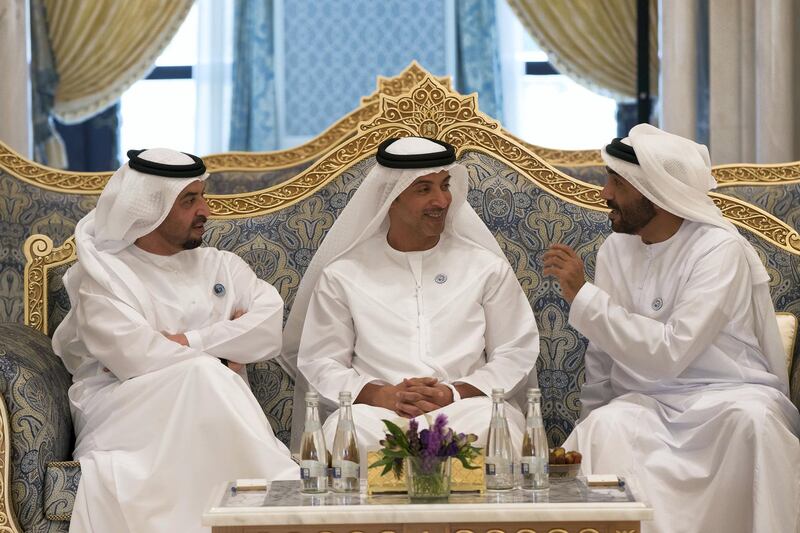 ABU DHABI, UNITED ARAB EMIRATES - May 20, 2018: \(L-R) HH Sheikh Hamdan bin Zayed Al Nahyan, Ruler’s Representative in Al Dhafra Region, HH Sheikh Hazza bin Zayed Al Nahyan, Vice Chairman of the Abu Dhabi Executive Council and HH Sheikh Nahyan Bin Zayed Al Nahyan, Chairman of the Board of Trustees of Zayed bin Sultan Al Nahyan Charitable and Humanitarian Foundation, attend an iftar reception at the Presidential Palace. 

( Mohamed Al Hammadi / Crown Prince Court - Abu Dhabi )
---