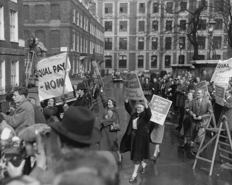 Equal Pay for Women activists demonstrate as chancellor Rab Butler leaves Conservative Party headquarters to present his Budget in 1954