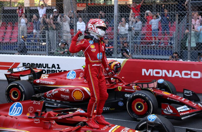 Ferrari's Charles Leclerc celebrates after winning the Monaco Grand Prix. Reuters