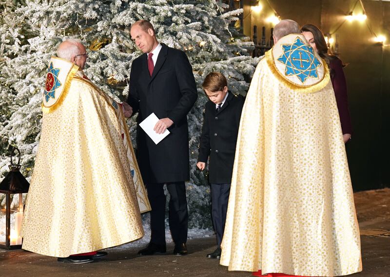 Prince William shakes hands with the Dean of Westminster, David Hoyle, at the Abbey on Thursday night. PA