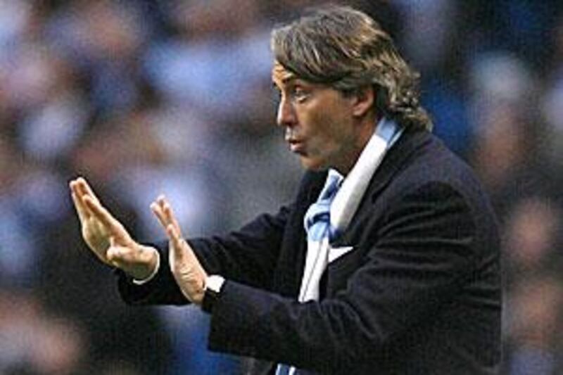 Roberto Mancini insists he is going nowhere.