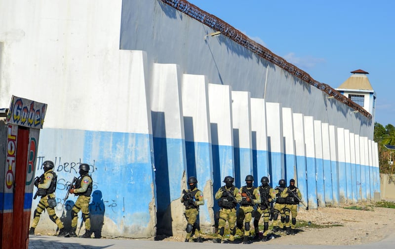 Police patrol outside Croix-des-Bouquets prison in Port-au-Prince, Haiti. EPA