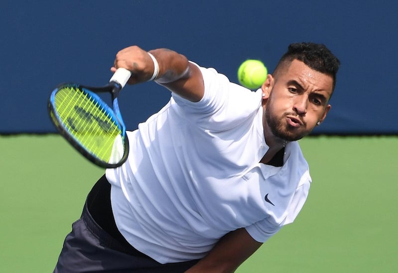 FILE PHOTO:    Aug 7, 2018; Toronto, Ontario, Canada; Nick Kyrgios of Australia plays a shot against Stan Wawrinka of Switzerland (not shown) in the Rogers Cup tennis tournament at Aviva Centre. Mandatory Credit: Dan Hamilton-USA TODAY Sports/File Photo