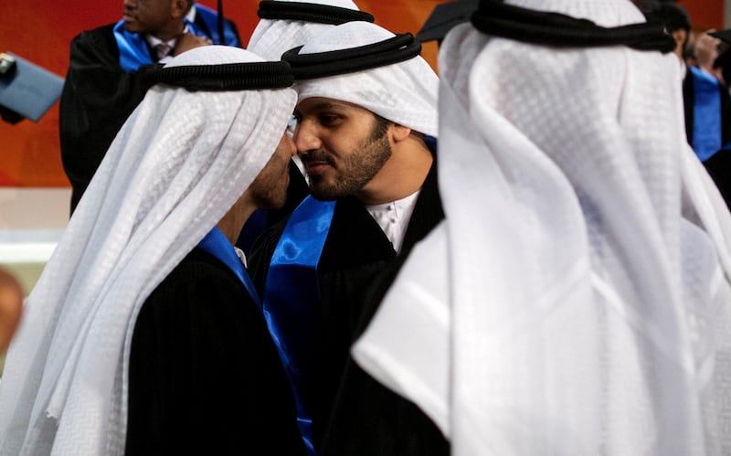 Abu Dhabi, United Arab Emirates, June 4, 2014:    Two Emirati graduates greet each other during the Masdar Institute of Science and Technology commencement ceremony at Emirates Palace in Abu Dhabi on June 4, 2014. Christopher Pike / The National

Reporter:  N/A
Section: News


