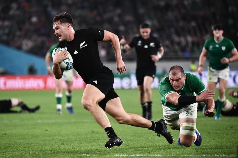 New Zealand's wing George Bridge (C) runs to score a try during the Japan 2019 Rugby World Cup quarter-final match between New Zealand and Ireland at the Tokyo Stadium in Tokyo. AFP