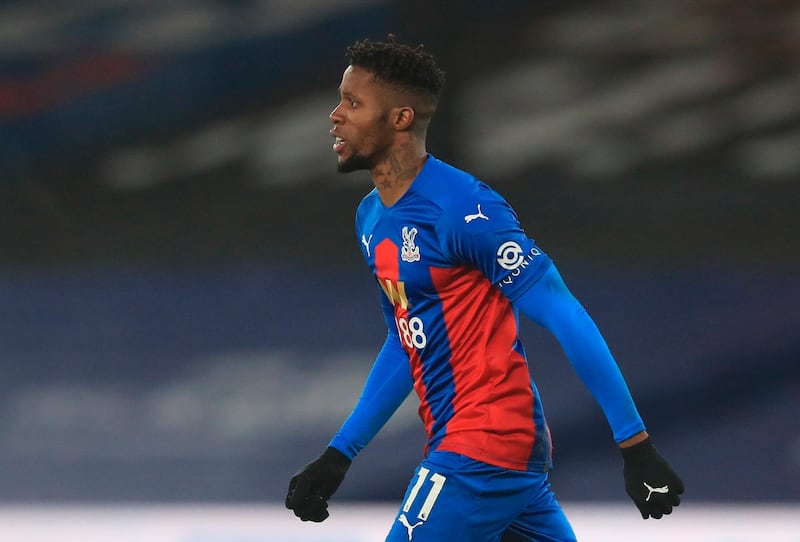 Wilfried Zaha celebrates after scoring against Leicester City. EPA