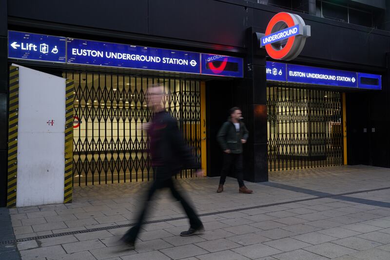 Closed shutters at the entrance to Euston underground station in central London during a strike by members of the Rail, Maritime and Transport union and Unite, in a long-running dispute over jobs and pensions. PA