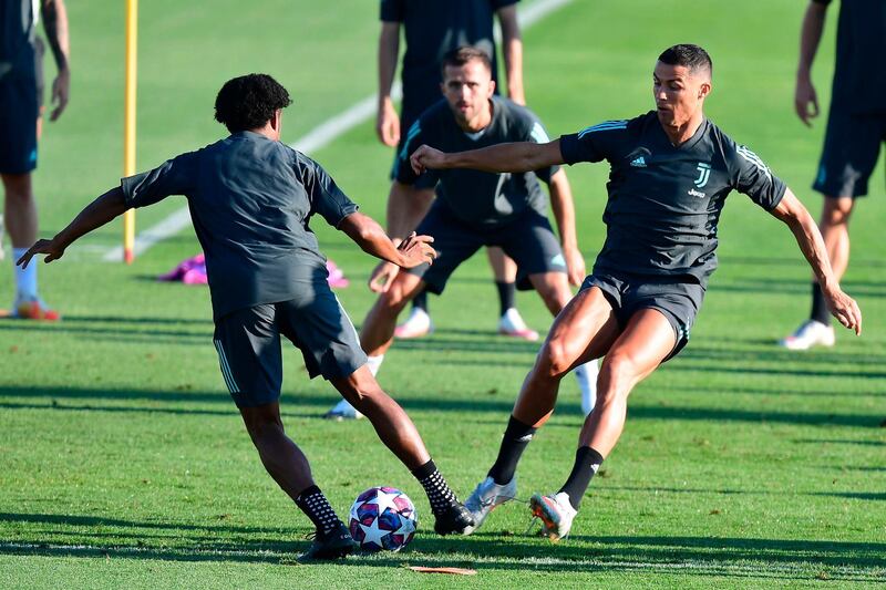 Cristiano Ronaldo training with teammates. AFP