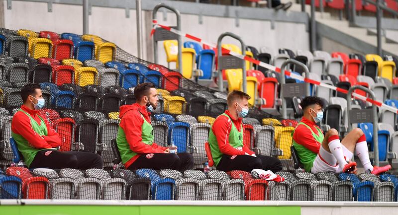 Dusseldorf's substitutes players on the bench. AFP