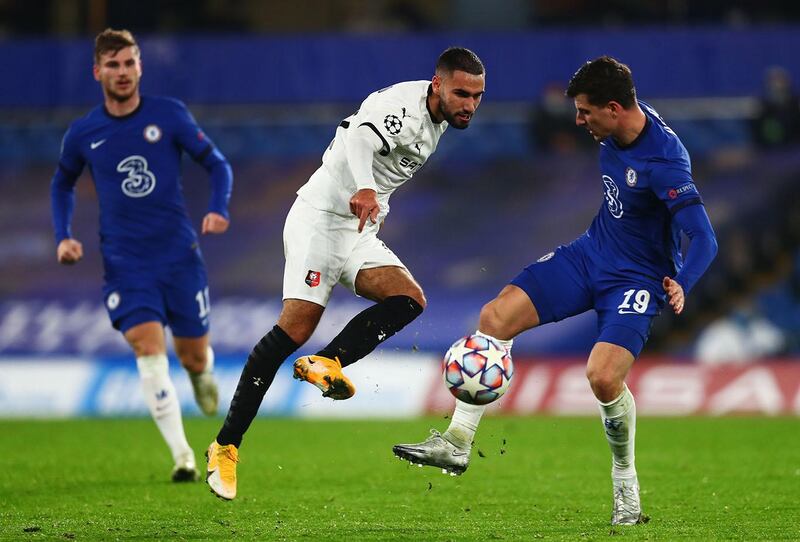LONDON, ENGLAND - NOVEMBER 04: Romain Del Castillo of Stade Rennais battles for possession with  Mason Mount of Chelsea  during the UEFA Champions League Group E stage match between Chelsea FC and Stade Rennais at Stamford Bridge on November 04, 2020 in London, England. Sporting stadiums around the UK remain under strict restrictions due to the Coronavirus Pandemic as Government social distancing laws prohibit fans inside venues resulting in games being played behind closed doors.  (Photo by Clive Rose/Getty Images)