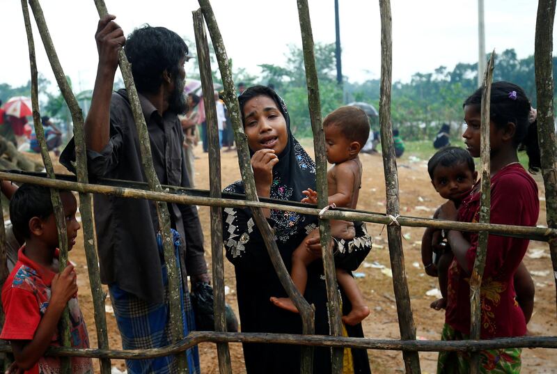 A new Rohingya refugee woman cries as they arrive near the Kutupalang makeshift Refugee Camp, in Cox���s Bazar, Bangladesh, August 30, 2017. REUTERS/Mohammad Ponir Hossain