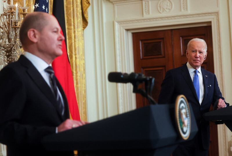 US President Joe Biden, right, holds a joint news conference with German Chancellor Olaf Scholz at the White House. Reuters