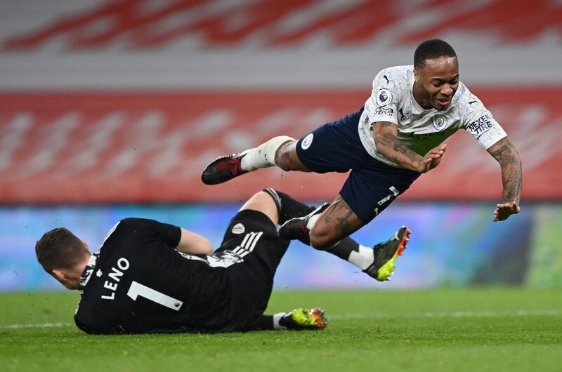 Arsenal goalkeeper Bernd Leno beats City's Raheem Sterling to the ball. Getty