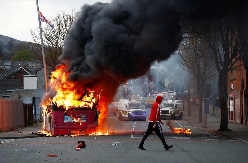 Demonstrators hijacked and torched a bus on the Shankill Road as protests continued in Belfast, Northern Ireland. Reuters