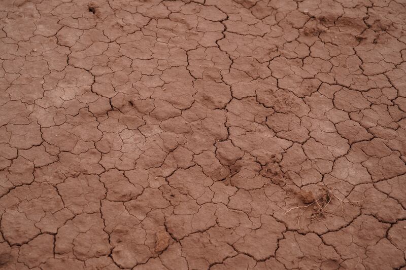 Dry, cracked earth where water would normally pool in the Bodaway area of the Navajo Nation reservation.