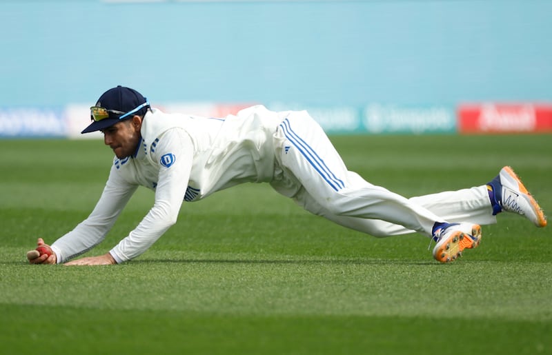 India's Shubman Gill takes the catch to dismiss England opener Ben Duckett for 27. Reuters