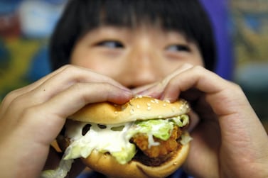 A bad diet at a young age can set children up for a life of poor health. Nicky Loh / Reuters