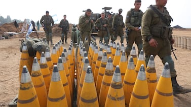 Israeli soldiers preparing ammunition near the Gaza border. EPA