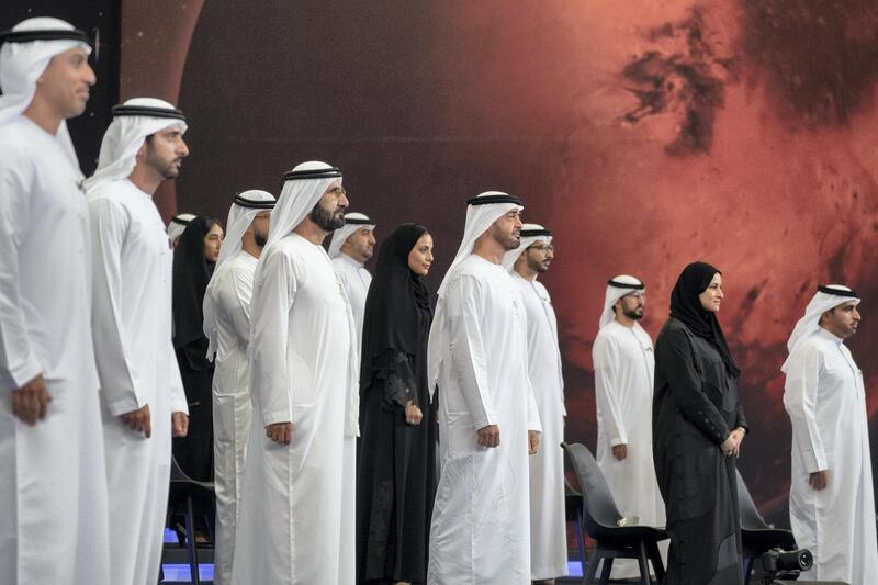 ABU DHABI, UNITED ARAB EMIRATES - July 31, 2020: HH Sheikh Mohamed bin Zayed Al Nahyan, Crown Prince of Abu Dhabi and Deputy Supreme Commander of the UAE Armed Forces front (front row 4th L), HH Sheikh Mohamed bin Rashid Al Maktoum, Vice-President, Prime Minister of the UAE, Ruler of Dubai and Minister of Defence (front row 5th L) and HH Sheikh Hamdan bin Mohamed Al Maktoum, Crown Prince of Dubai (front row 2nd L), stand for a photograph with the Hope Probe team, during an honoring ceremony, at Qasr Al Watan.

( Hamad Al Kaabi / Ministry of Presidential Affairs )​
---