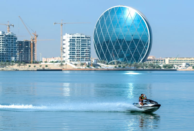 Abu Dhabi, UAE, April 30, 2021. Recreational watercraft is a common sight on weekends along the Al Raha Creek, Aldar Headquarters area.. Victor Besa / The National.