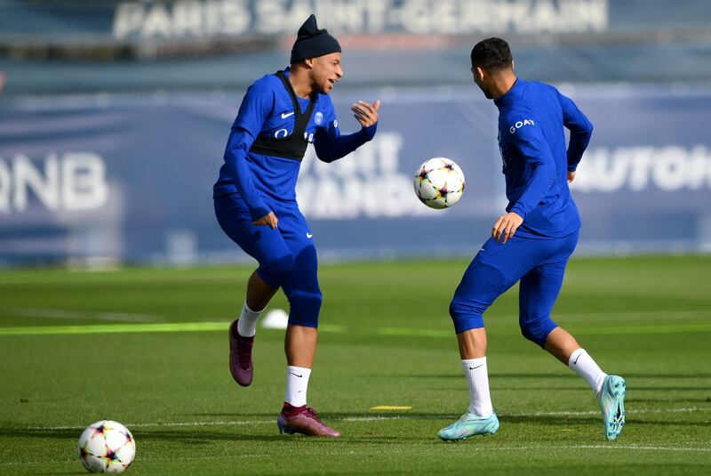 Kylian Mbappe and Achraf Hakimi during a training session on Monday. AFP