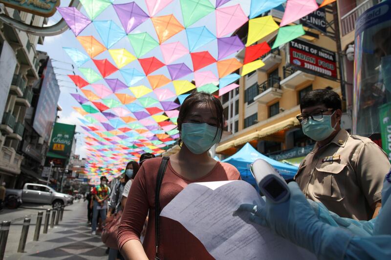 Residents queue for a coronavirus nasal swab test, in Bangkok, Thailand. Reuters