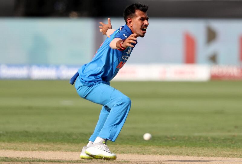 Dubai, United Arab Emirates - September 23, 2018: India's Yuzvendra Chahal takes the wicket of Pakistan's Imam-ul-Haq during the game between India and Pakistan in the Asia cup. Sunday, September 23rd, 2018 at Sports City, Dubai. Chris Whiteoak / The National