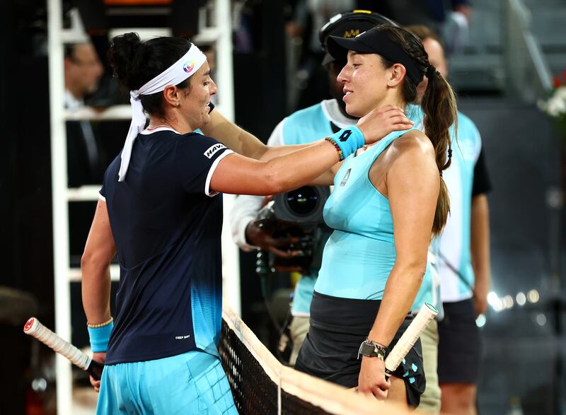 Ons Jabeur and Jessica Pegula greet each other at the net following the Madrid Open final. Getty