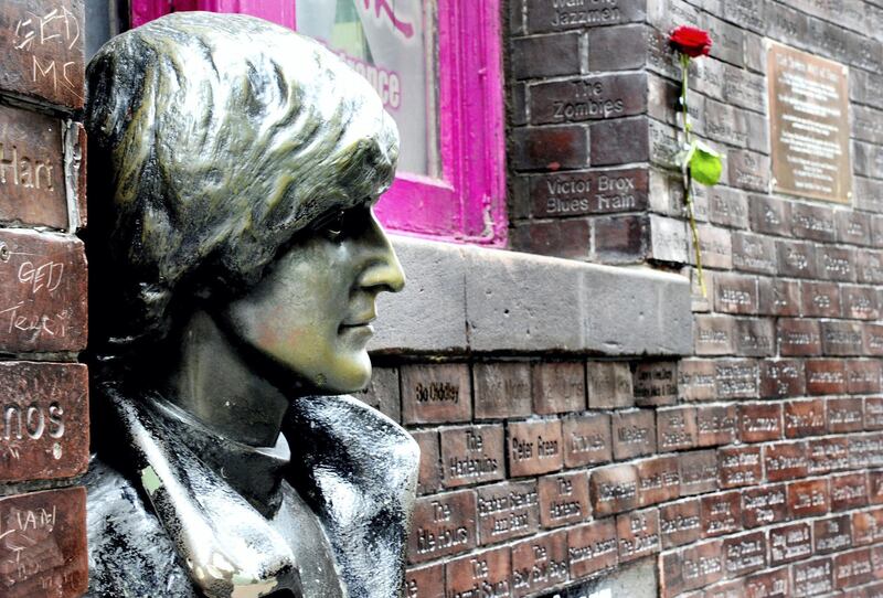 LIVERPOOL, ENGLAND - AUGUST 03:  Tributes are left for Cilla Black with the John Lennon staute outside The Cavern Club in her home town Liverpool on August 3, 2015 in Liverpool, England.  (Photo by Shirlaine Forrest/Getty Images)