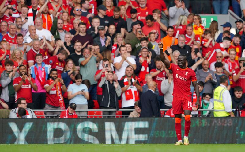 Sadio Mane celebrates after scoring the opening goal for Liverpool at Anfield. AFP