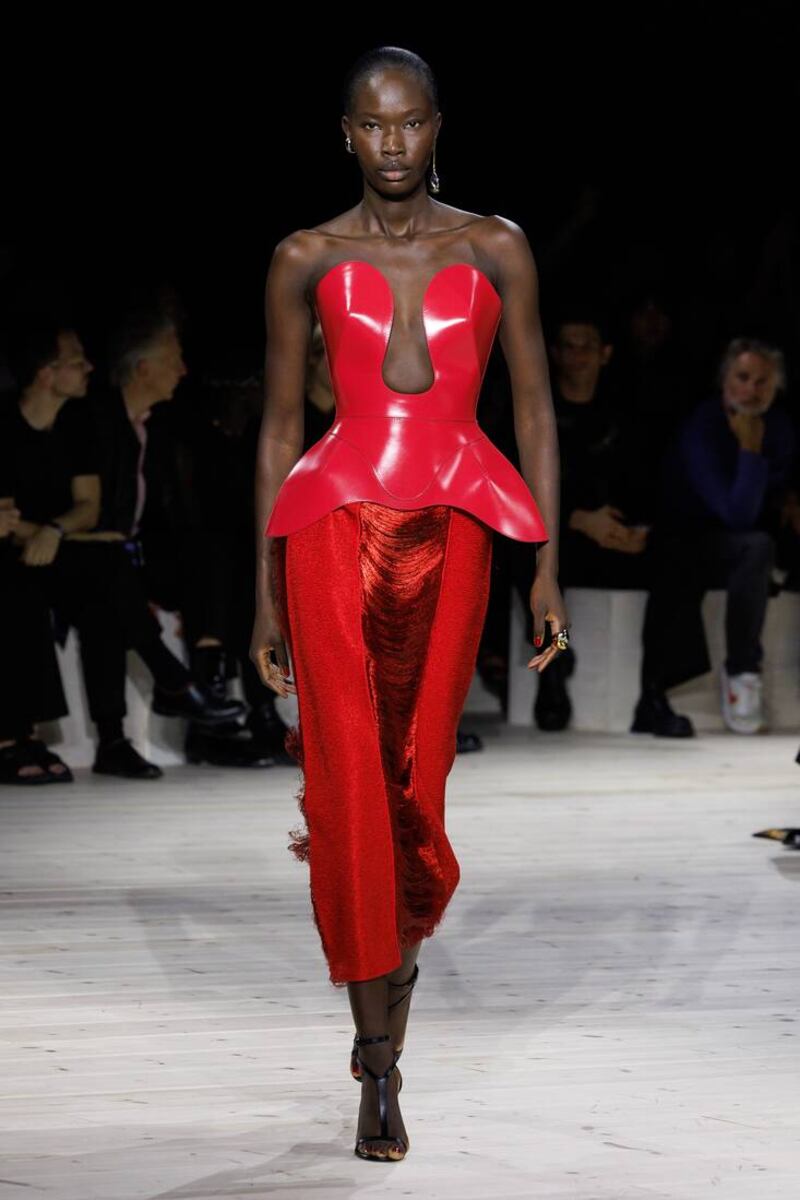 A red bodice and a shredded skirt by Sarah Burton in her last collection for the house. Photo: Alexander McQueen