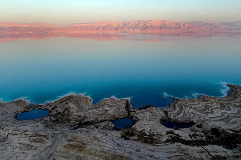 Ittai Gavrieli of the Israel Geological Institute says the shores of the Dead Sea are pockmarked with thousands of sinkholes.