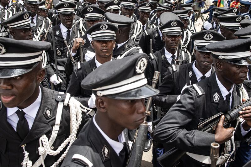 Officers of the Senegalese Armed Forces get themselves ready to take part in celebrations for Senegal’s 63rd Independence Day in Dakar. AFP