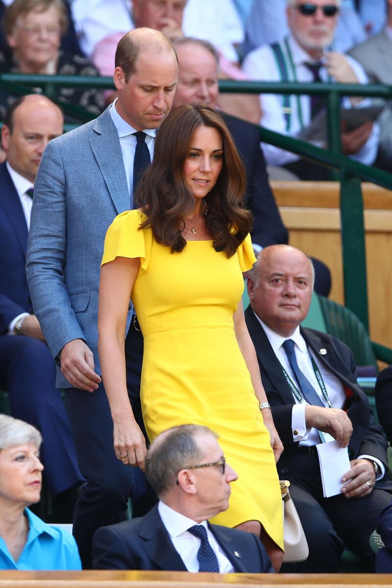 Arriving at the Wimbledon Men's Singles final, wearing a yellow Dolce & Gabbana dress. Getty Images