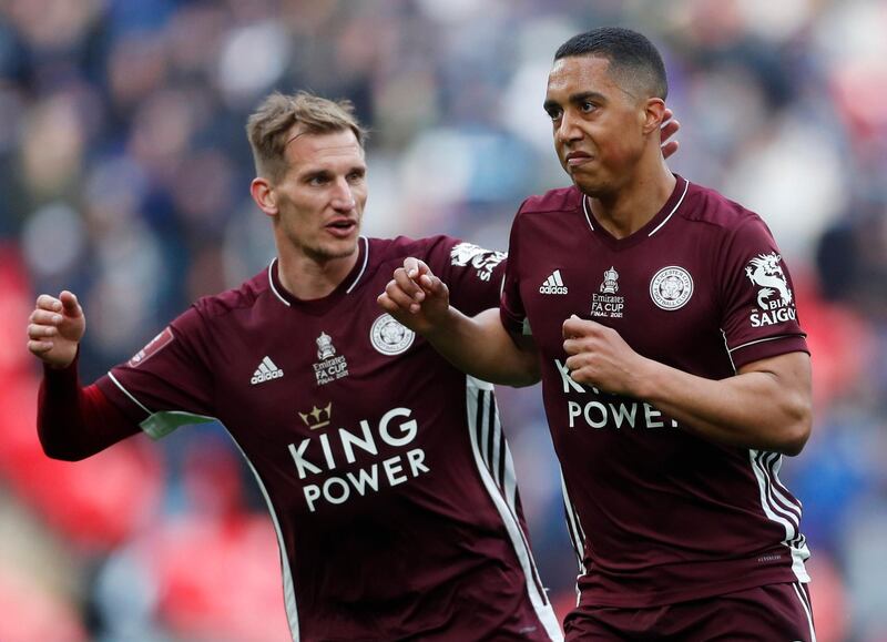 Youri Tielemans celebrates with Marc Albrighton after scoring for Leicester. Reuters