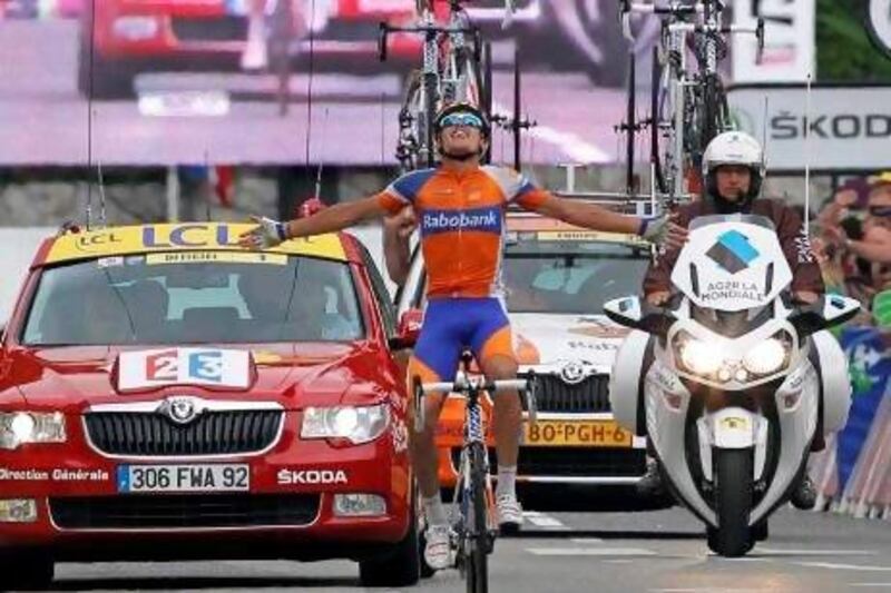 Rabobank Cycling Team rider Luis Leon Sanchez was ecstatic to cross the finish first and collect the Stage 14 win while behind him ...