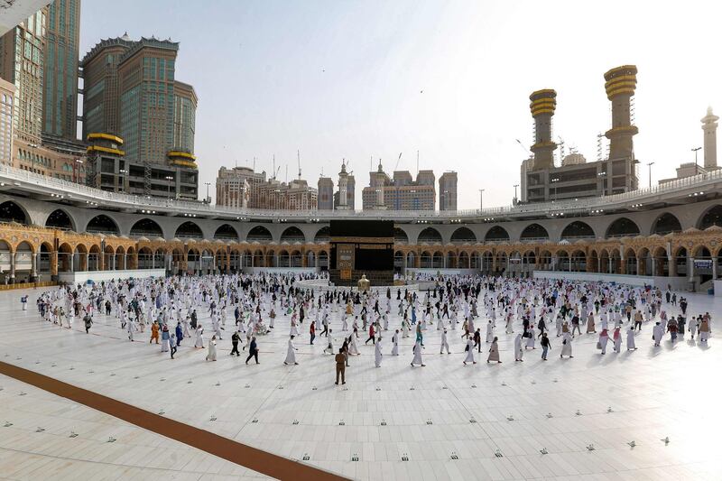 Muslim pilgrims circumambulate around the Kaaba, Islam's holiest shrine, at the centre of the Grand Mosque in the holy city of Mecca on the final day of the annual Muslim Hajj pilgrimage. AFP