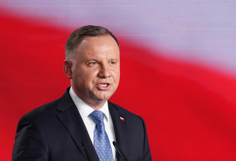 LOWICZ, POLAND - JUNE 28: Polish President and member of the right-wing Law and Justice (PiS) party Andrzej Duda speaks to supporters following initial results in the Polish presidential election during the coronavirus pandemic on June 28, 2020 in Lowicz, Poland. Initial results suggest Duda does not have more than 50% of the vote and will face Warsaw Mayor Rafal Trzaskowski, presidential candidate of the of the centrist Civic Platform (PO), in a runoff later this month. Todays election was originally scheduled for May but was postponed due to the coronavirus pandemic. (Photo by Sean Gallup/Getty Images)