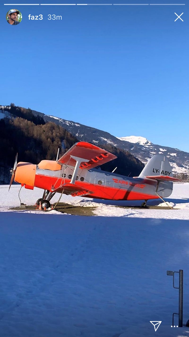 An orange plane for a quick fly around the snow Swiss mountains.