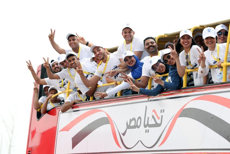 epa07548700 Suez Canal University students flash the Victory sign as they take part in the opening new Ismailia city near the Suez Canal, in Ismailia, 120km east of Cairo, Egypt, 05  May 2019. Reports state Egyptian President Abdel Fattah al-Sisi will officially open four tunnels beneath the Suez Canal in May. The Suez Canal development projects launched in 2015 aiming to develop residential and industrial areas in the central Suez Canal governorate of Ismailia. The establishment of the tunnels came at a cost of 18 billion Egyptian pounds (about one billion US dollars).  EPA/KHALED ELFIQI