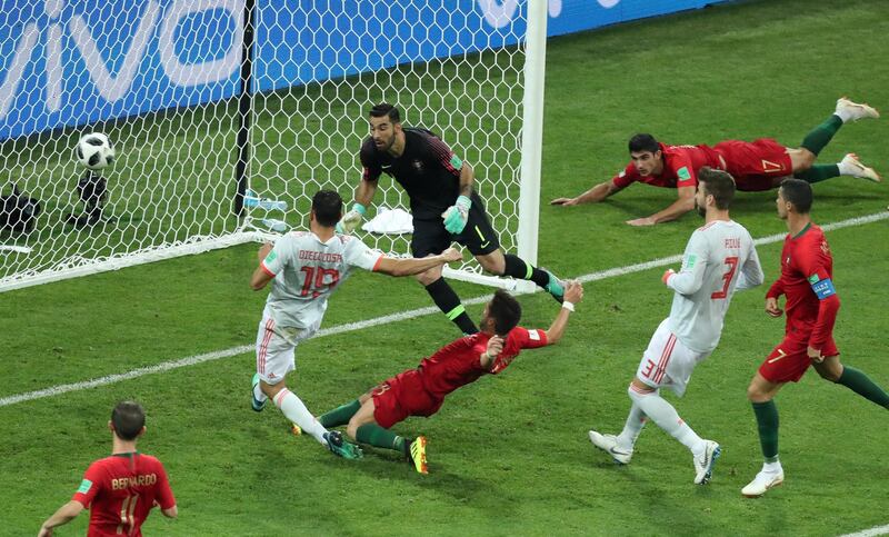 Match 4: Spain's Diego Costa scores against Portugal. Reuters