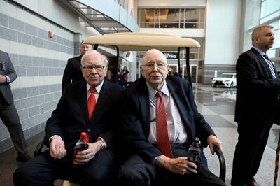 Berkshire Hathaway chairman Warren Buffett (left) along with his long-time vice chairman, 98-year-old Charlie Munger. Reuters
