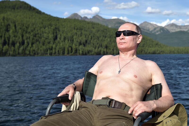Putin sunbathes during his vacation in the remote Tuva region in southern Siberia on August 04, 2017. AFP