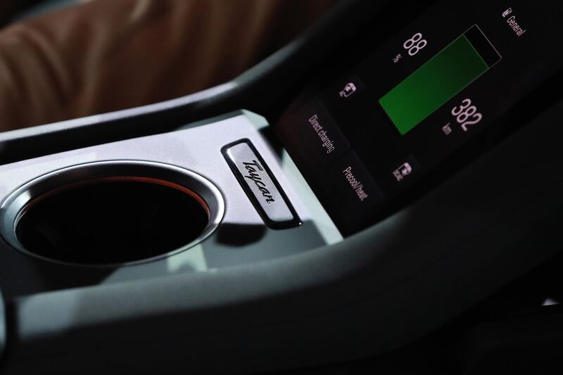 Battery level information is displayed on a center console screen inside the all electric Porsche AG Taycan luxury automobile. Bloomberg