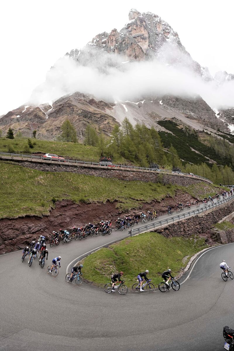 The peloton rides on Passo del Brocon during Stage 17. AP