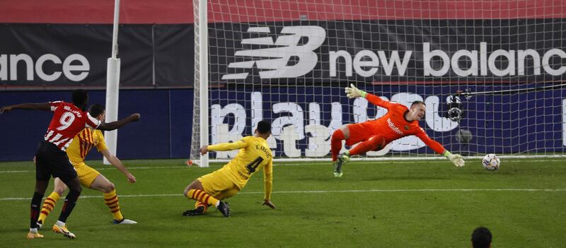 Athletic Bilbao striker Inaki Williams scores the first goal against Barcelona. EPA