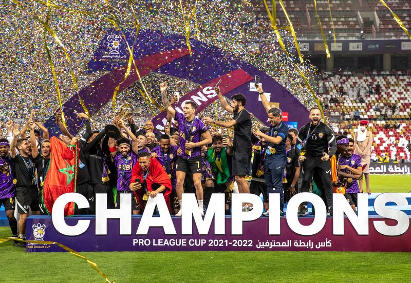 Al Ain players celebrate their win at the  Pro League Cup final against Shabab Al Ahli at Mohamed bin Zayed Stadium in Abu Dhabi. 